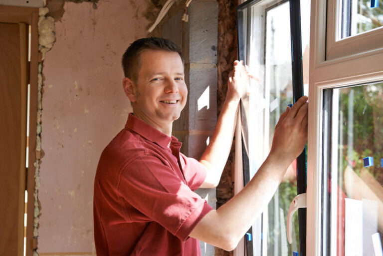 man installing new windows