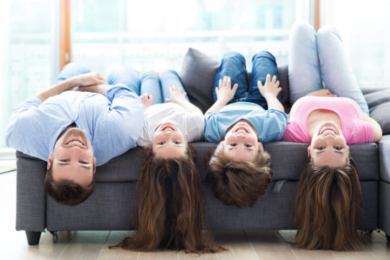 family hanging upside down