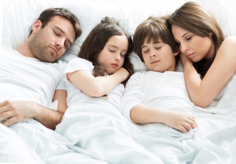 family of three sleeping peacefully